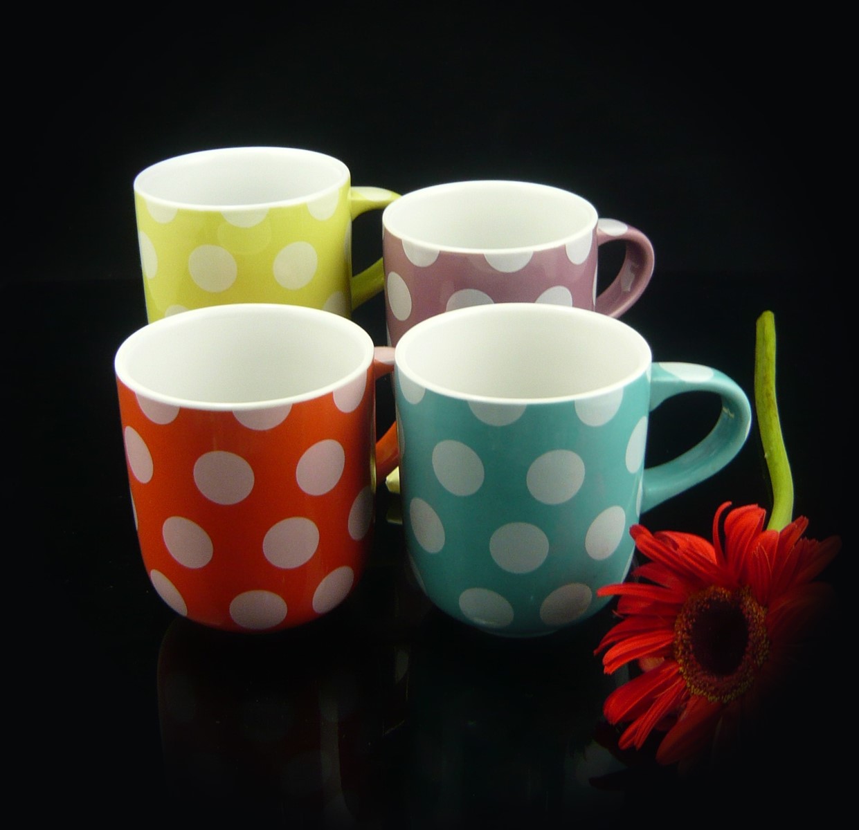 Glazed ceramic polka dot coffee mug