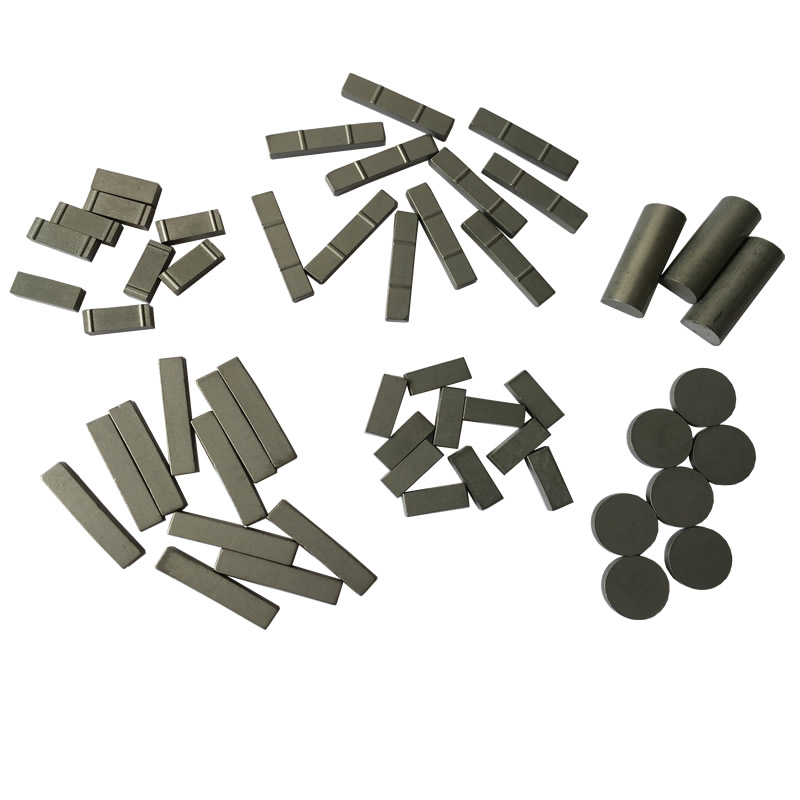 Tungsten carbide tips for oil field stabilizer