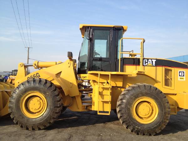 Caterpillar перевод на русский. Погрузчик Caterpillar 966gc. Caterpillar 966g II. Фронтальный погрузчик 966g. Cat 966 фронтальный погрузчик.