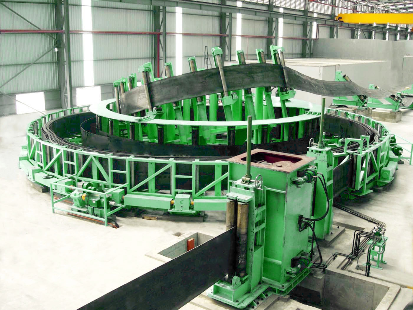 Spiral accumulator used for material storage loading unloading and driving strip steel