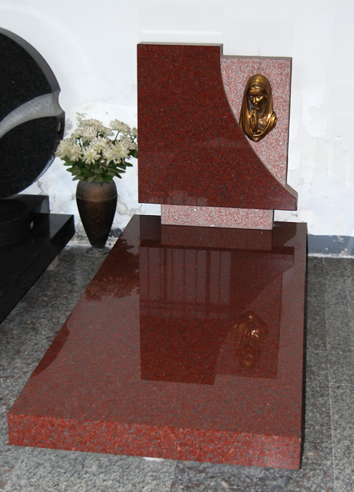 red headstone granite monument with slab