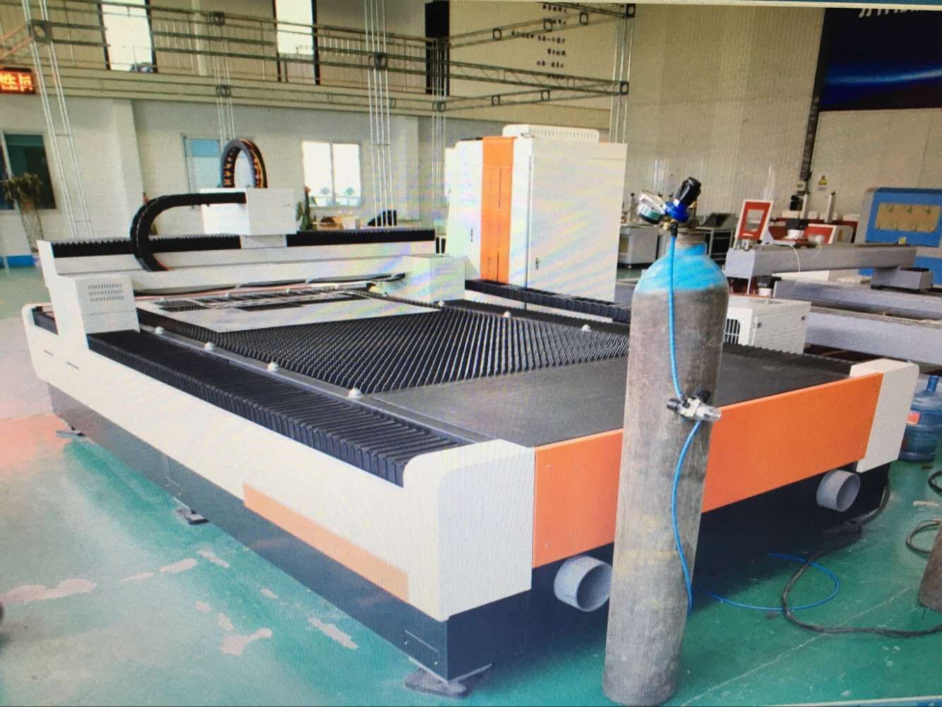 1325 1530 fiber laser cutting machine carding filling machine for metal