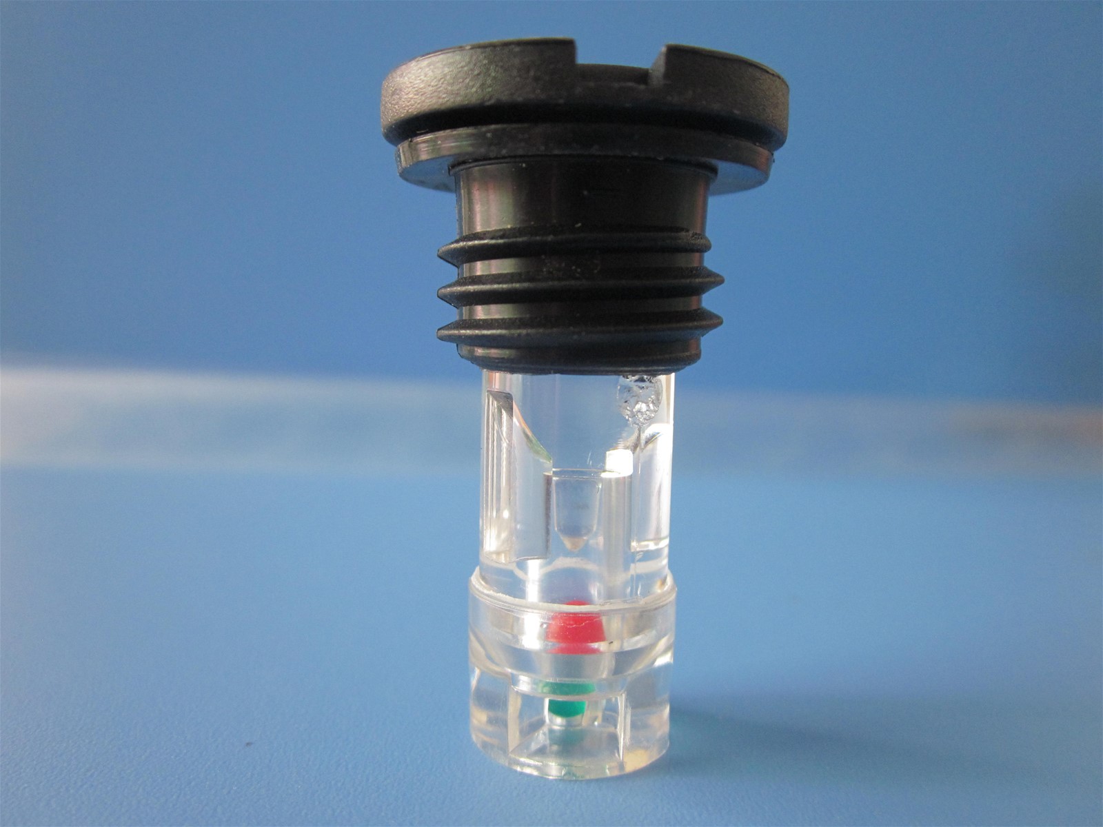 battery charge indicator with plastic head