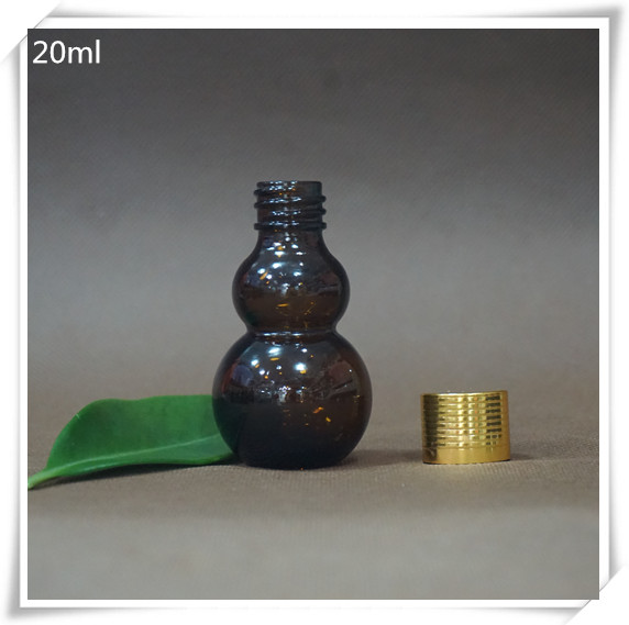 Good quality double gourd shape brown glass essential oil bottle wholesale
