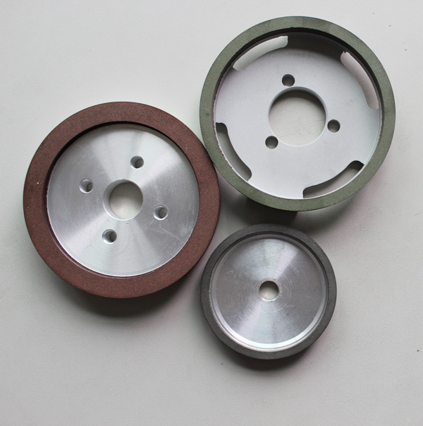 Grinding wheel for grinding knives and blades