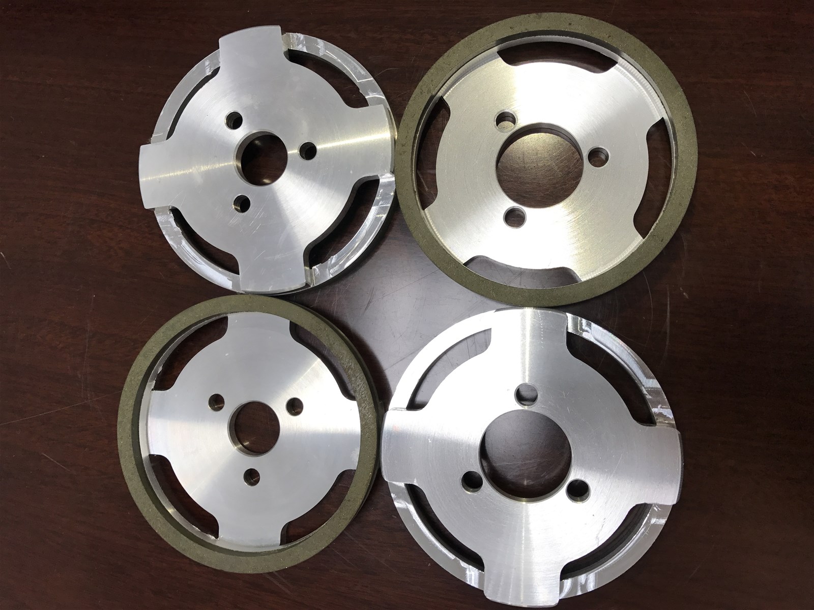 Grinding wheel for grinding knives and blades