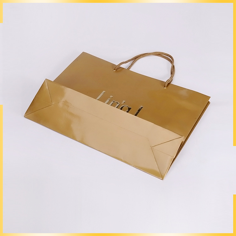 Factory price luxury customized gold hot stamping shopping wedding gift paper bag by China manufactures