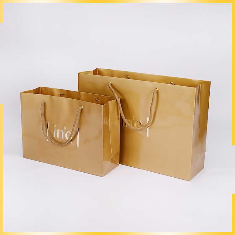 Factory price luxury customized gold hot stamping shopping wedding gift paper bag by China manufactures