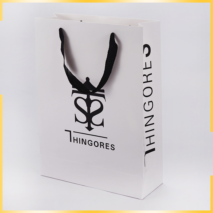 Promotional elegant apperance sole printing three stranded rope fancy paper gift bag for wholesale
