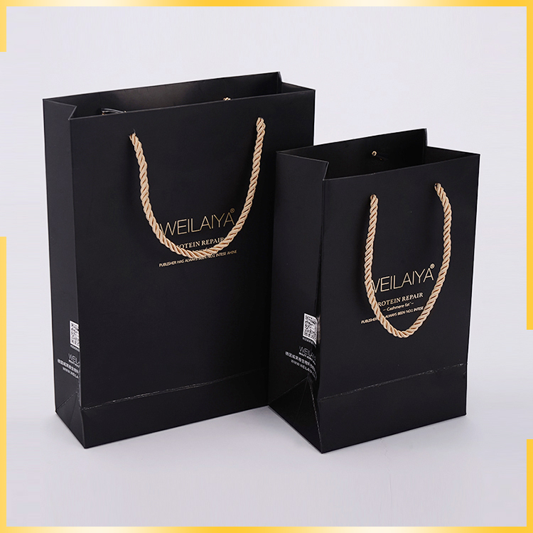 Promotional elegant apperance sole printing three stranded rope fancy paper gift bag for wholesale