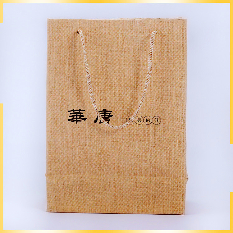 Attractive design enviornmental cloth imitated and part of UV customised paper bag with logo for packaing