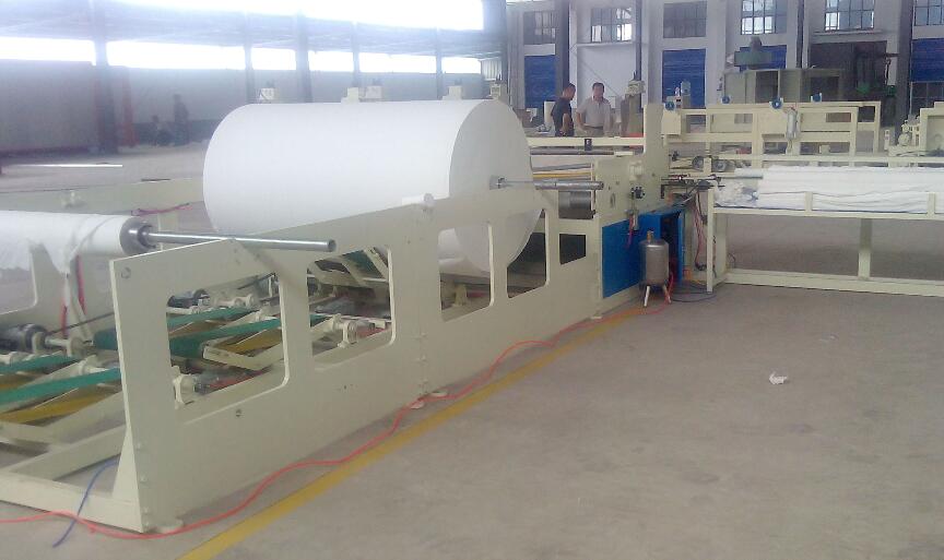 Toilet tissue paper rewinding machine