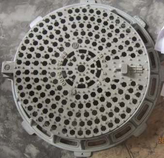 Cast iron squareroundoctagonal frame as supporting base and a round grate