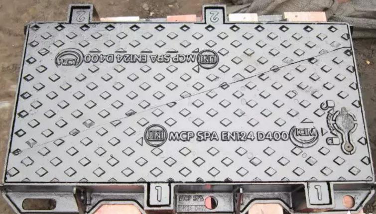 Cast iron telecom manhole cover