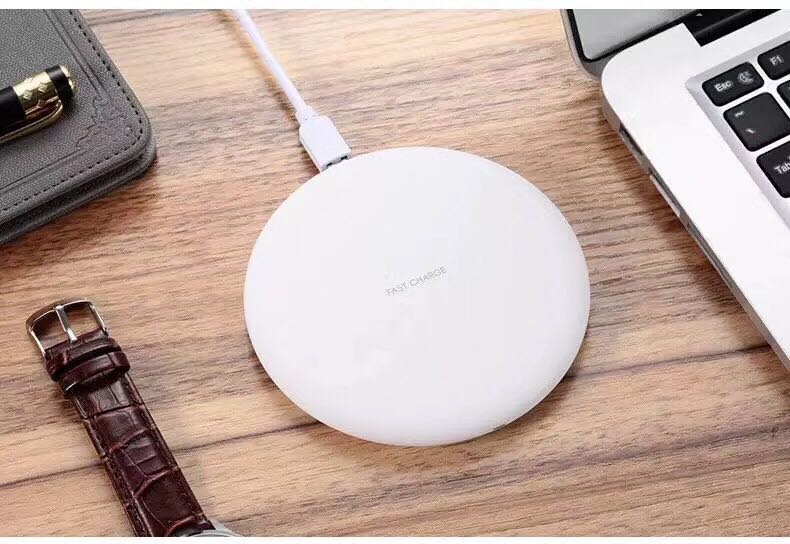 latest small round wireless charger for Qi phones