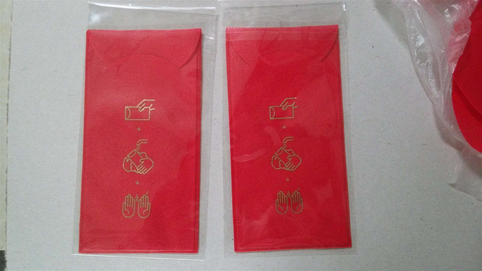 Red envelopes full of happy New Years money Instant paper soap