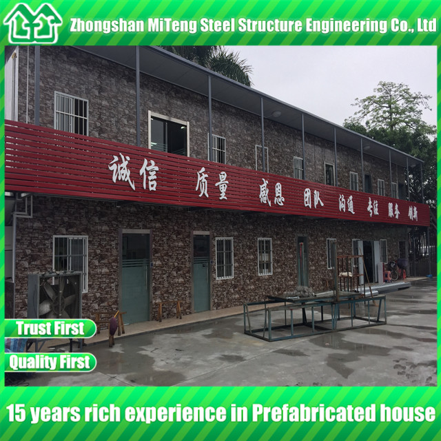 Luxury low cost prefab home steel building with cultural stone sandwich panel