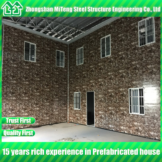 Luxury low cost prefab home steel building with cultural stone sandwich panel