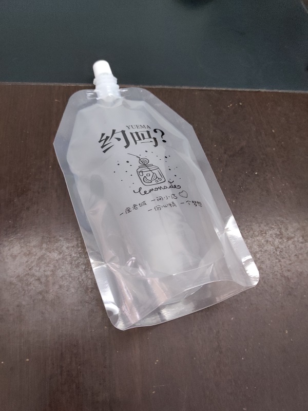 Spout pouch for beverage filling