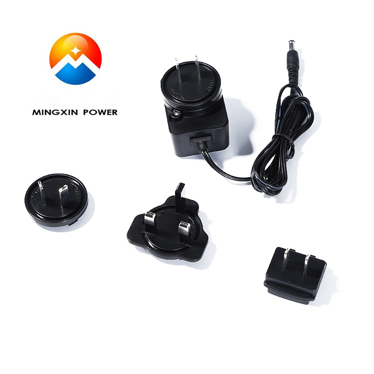 9V15A 15V1A Universal Power Adapter with exchangeable US EU AU UK plugs