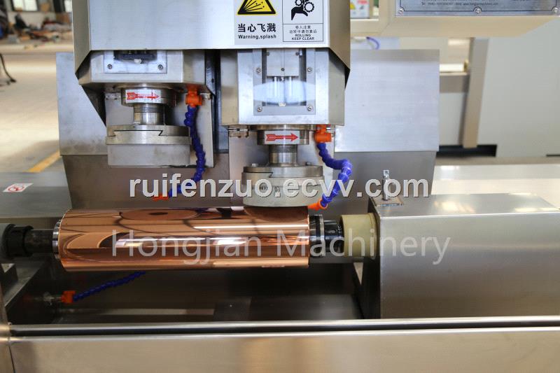 Copper grinding machine for the rotogravure cylinder