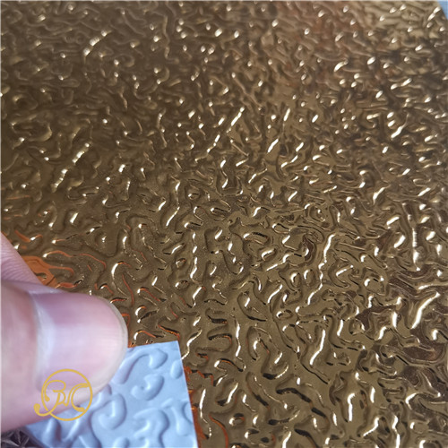 Embossed metallic PETPVC laminated film for heat insulation roof panels