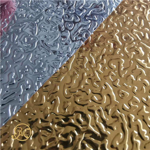 Embossed metallic PETPVC laminated film for heat insulation roof panels