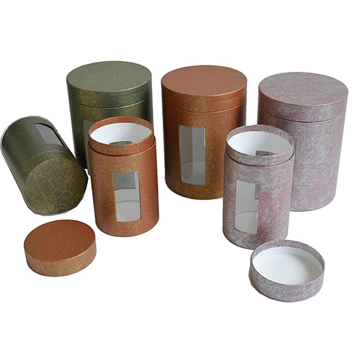 Paper tube with flip lid neck and embedded PET window in the base