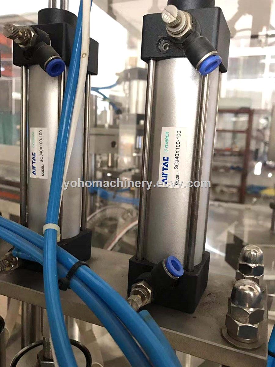 automatic rotary filling capping machine for ice cream stand up filling and capping machine