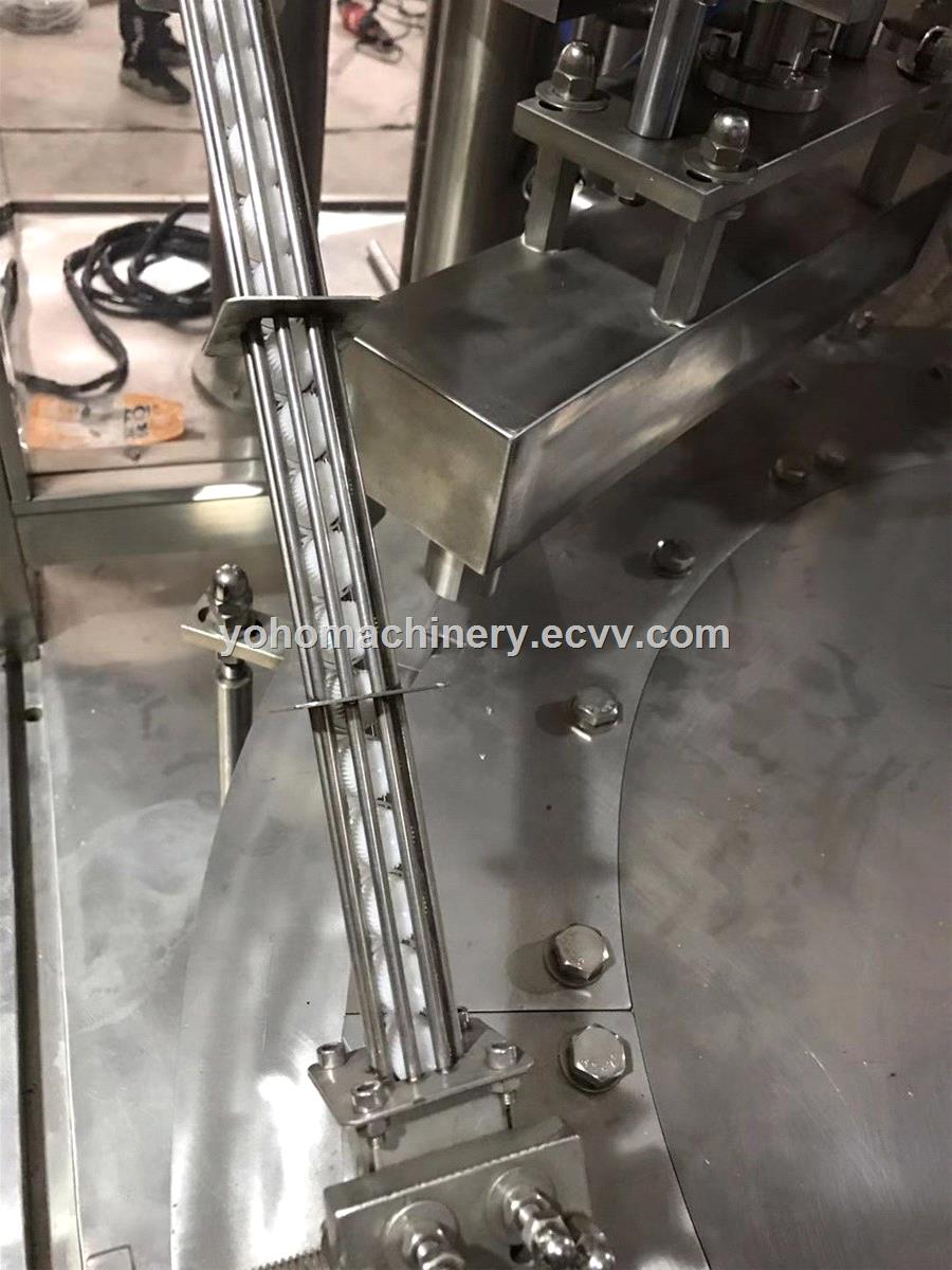 automatic rotary filling capping machine for ice cream stand up filling and capping machine