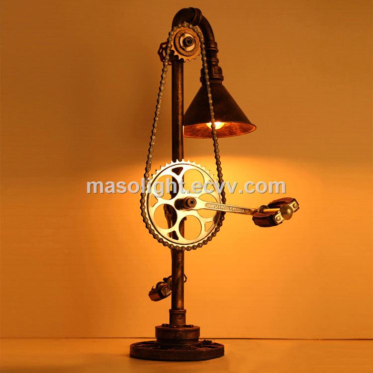 Industrial LED bike table lamp in gold rustic with Edison lights