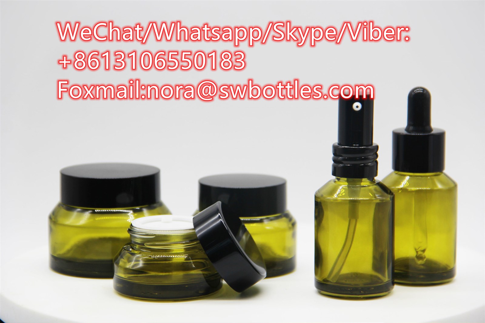 Wholesale inclined shoulder pickles green glass cosmetic bottles cream packaging glass bottles