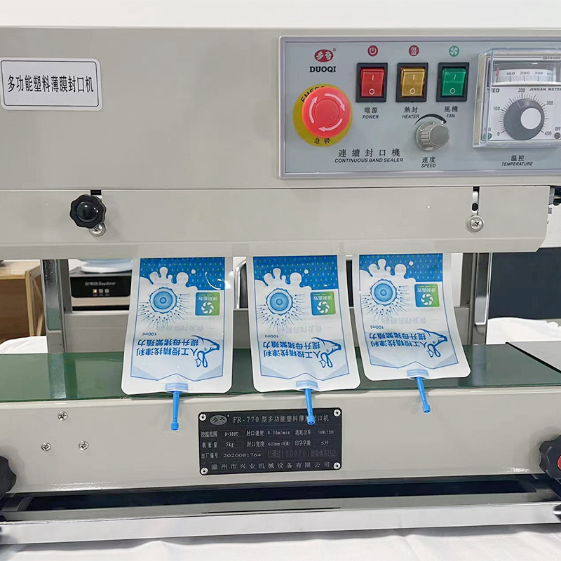 The continuous sealing machine has the printing function the sealing temperature is adjustable the transmission functi