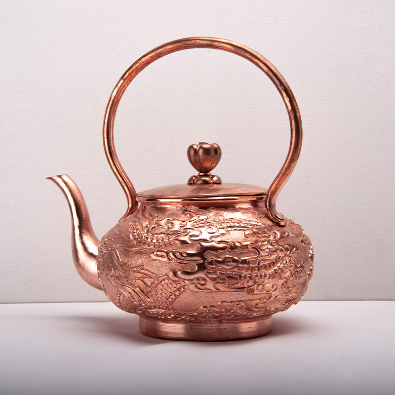 The exquisite copper pot is totally carved by hand handmade teapot